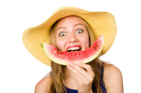 Woman eating watermelon isolated on whiteの写真素材