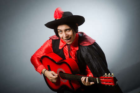 Man playing guitar in romantic conceptの写真素材