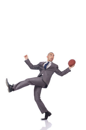 Man with american football ball isolated on whiteの写真素材