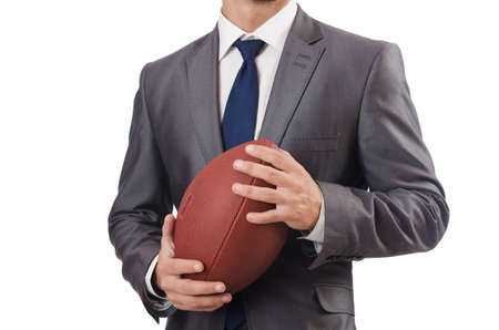 Man with american football ball isolated on whiteの写真素材