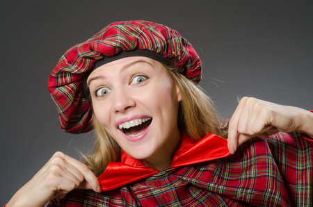 Woman wearing traditional scottish clothingの写真素材