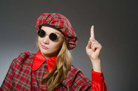 Woman wearing traditional scottish clothing