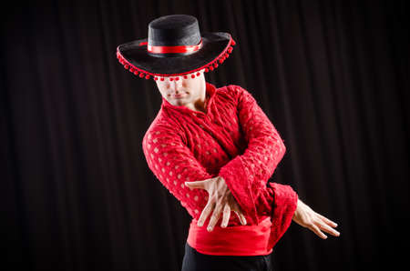 Man dancing spanish dance in red clothingの写真素材