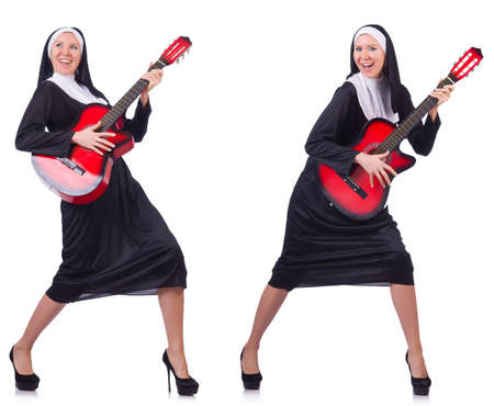 Nun with guitar isolated on whiteの写真素材