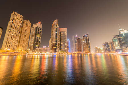 Dubai - JANUARY 10, 2015: Marina district on January 10 in UAE, Dubai. Marina district is popular residential area in Dubaiのeditorial素材