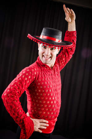 Man dancing spanish dance in red clothingの写真素材