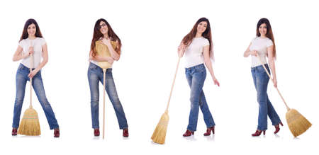 Woman with broom isolated on whiteの写真素材