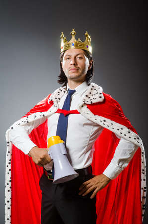 Young king businessman in royal conceptの写真素材