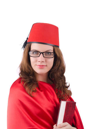 Woman wearing fez hat isolated on whiteの写真素材