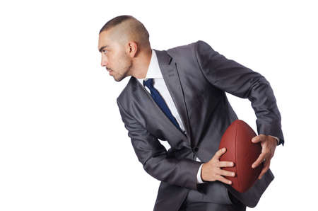 Man with american football ball isolated on whiteの写真素材