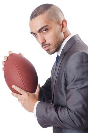 Man with american football ball isolated on whiteの写真素材