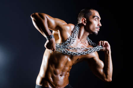 Ripped muscular man in sports conceptの写真素材