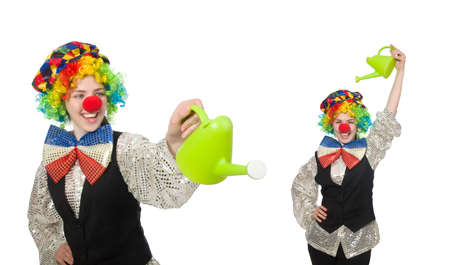Female clown with watering can isolated on white