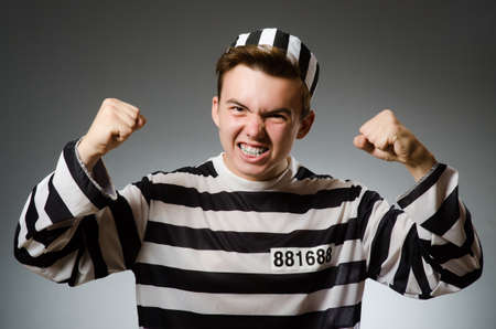 Funny prisoner in prison conceptの写真素材