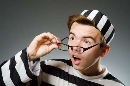 Funny prisoner in prison conceptの写真素材