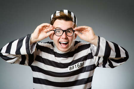 Funny prisoner in prison conceptの写真素材