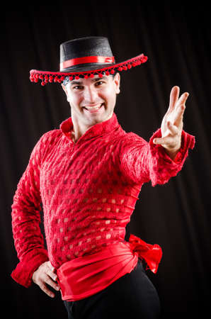 Man dancing spanish dance in red clothingの写真素材