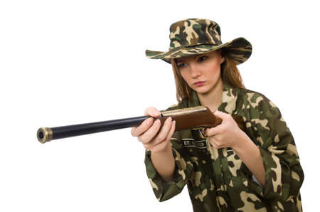 Girl in military uniform holding the gun isolated on whiteの写真素材