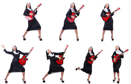 Nun with guitar isolated on whiteの写真素材