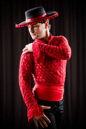 Man dancing spanish dance in red clothingの写真素材