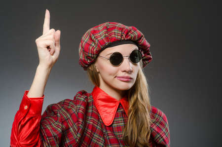 Woman wearing traditional scottish clothingの写真素材