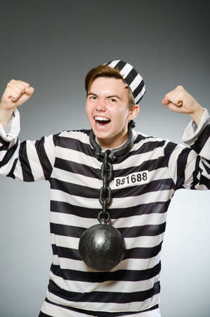 Funny prisoner in prison conceptの写真素材