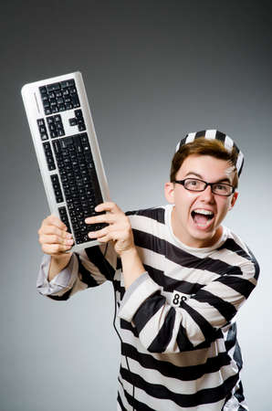 Funny prisoner in prison conceptの写真素材