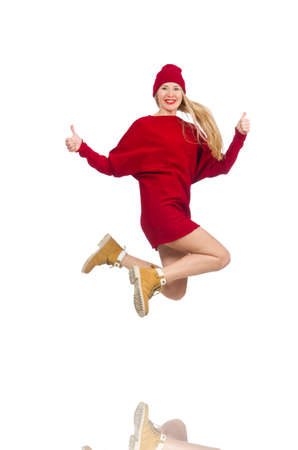 Pretty girl in red dress isolated on whiteの写真素材