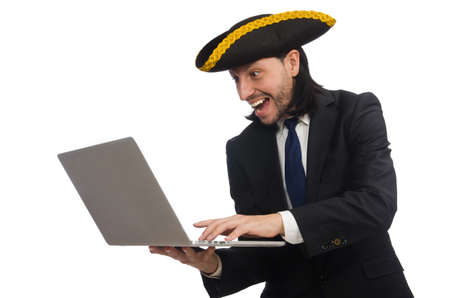 Pirate businessman holding laptop isolated on whiteの写真素材