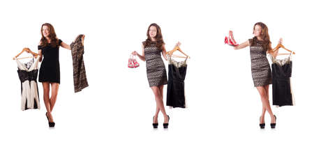 Young woman trying new clothing on whiteの写真素材