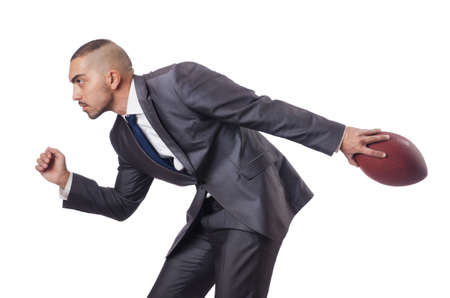 Man with american football ball isolated on whiteの写真素材