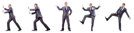 Businessman in various poses isolated on whiteの写真素材