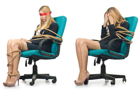 Businesswoman woman tied up with rope on whiteの写真素材