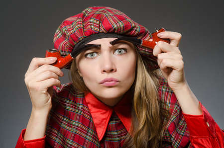 Woman wearing traditional scottish clothingの写真素材