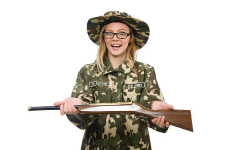 Girl in military uniform holding the gun isolated on white