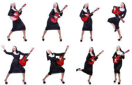 Nun with guitar isolated on whiteの写真素材