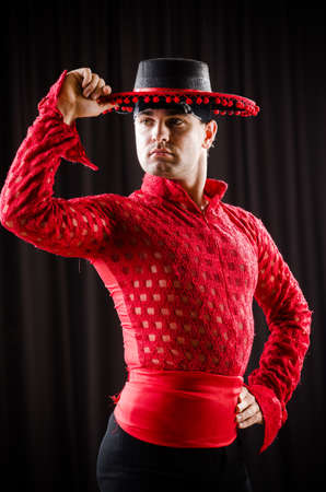 Man dancing spanish dance in red clothingの写真素材