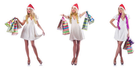 Woman with shopping bags isolated on whiteの写真素材