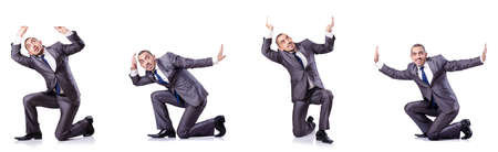 Businessman in various poses isolated on whiteの写真素材