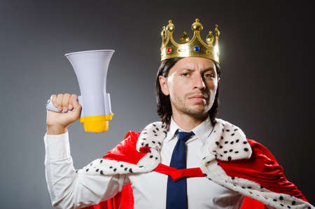 Young king businessman in royal conceptの写真素材