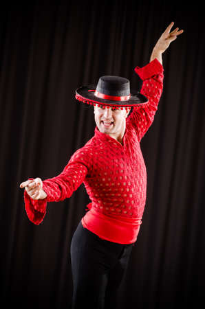 Man dancing spanish dance in red clothingの写真素材