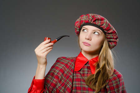 Woman wearing traditional scottish clothingの写真素材