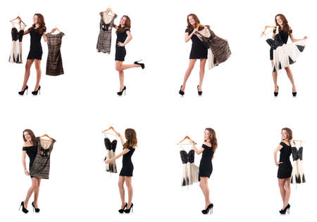 Young woman trying new clothing on whiteの写真素材