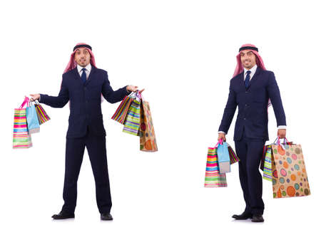 Arab man with shopping gifts on whiteの写真素材