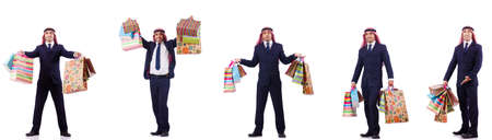 Arab man with shopping gifts on whiteの写真素材