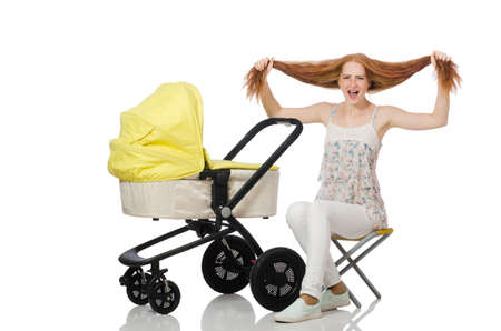 Woman with baby and pram isolated on white