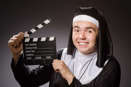 Funny man wearing nun clothingの写真素材