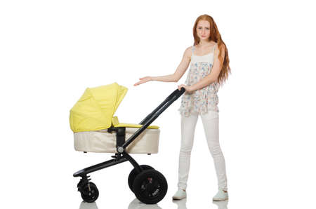 Woman with baby and pram isolated on white