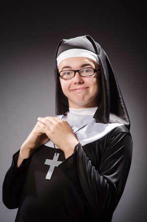 Funny man wearing nun clothingの写真素材