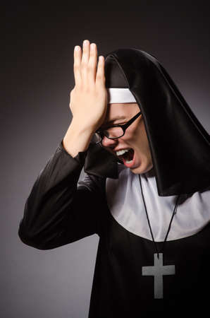 Funny man wearing nun clothingの写真素材